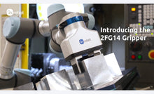Load image into Gallery viewer, La pince parallèle OnRobot 2FG14 est une solution de préhension entièrement électrique, conçue pour les robots industriels et collaboratifs dans des environnements de production exigeants. Grâce à sa capacité de charge utile élevée (jusqu’à 14 kg) et à sa structure robuste certifiée IP67, elle permet de manipuler des pièces lourdes, volumineuses ou irrégulières avec une précision constante, même en présence de fluides, de copeaux ou de poussières