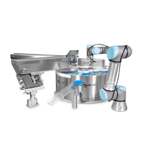 Load image into Gallery viewer, Le système FlexiBowl est un distributeur de pièces rotatif, circulaire, et adaptable, conçu pour les opérations d&#39;alimentation de pièces en vrac. Il offre une grande flexibilité et peut être intégré à divers systèmes de vision. Le FlexiBowl d’Ars Automation se différencie des systèmes vibrants linéaires classiques en offrant une installation de production rapide et facile.
